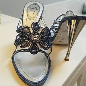 Never worn, too small for my wife.